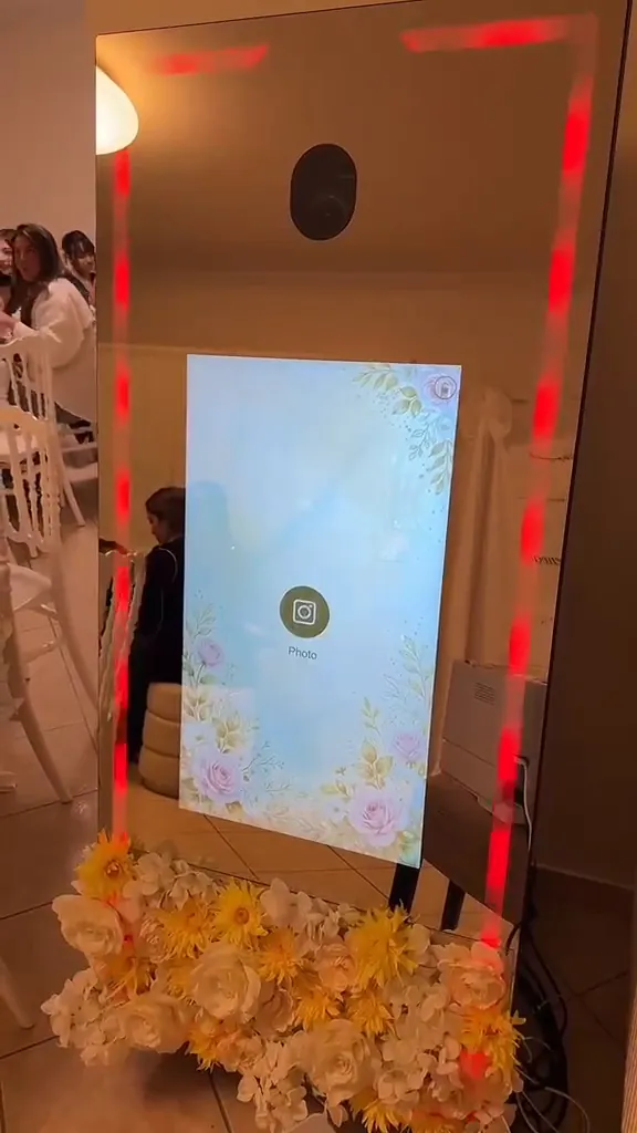 Photo : écran de sélection du photobooth WAWA et fleurs jaunes
